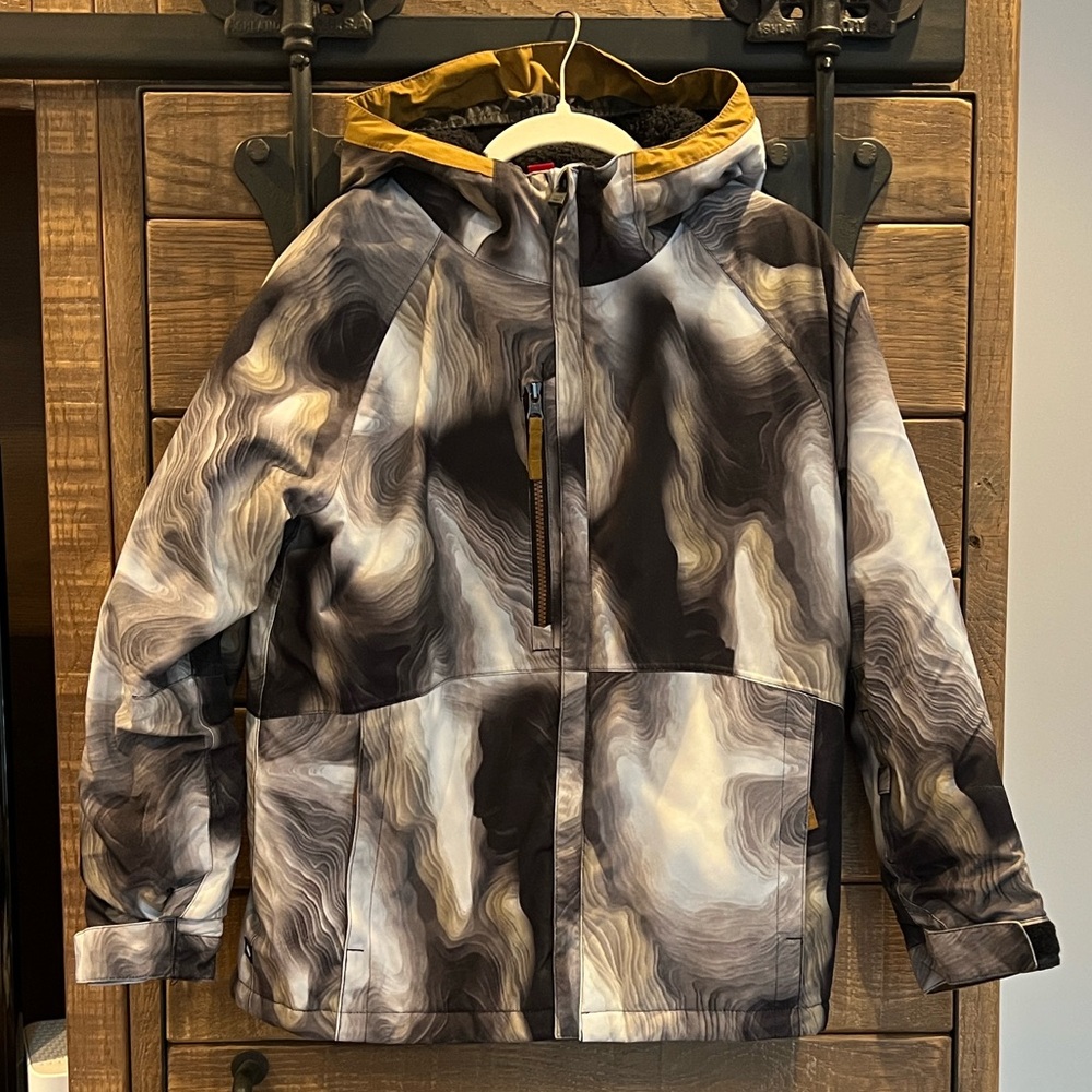 686 Ski and Snowboard Jacket in Black, Gray and White with light brown accents